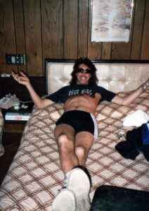 Perry lounging in our spectacular provided hotel room while recording our records